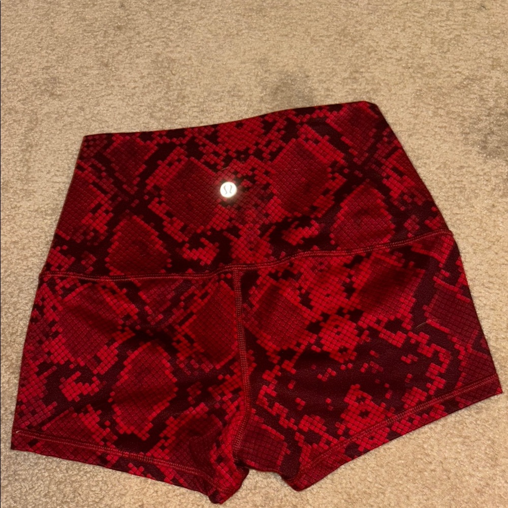 Lululemon Athletica Red Athletic Shorts with Bold Design